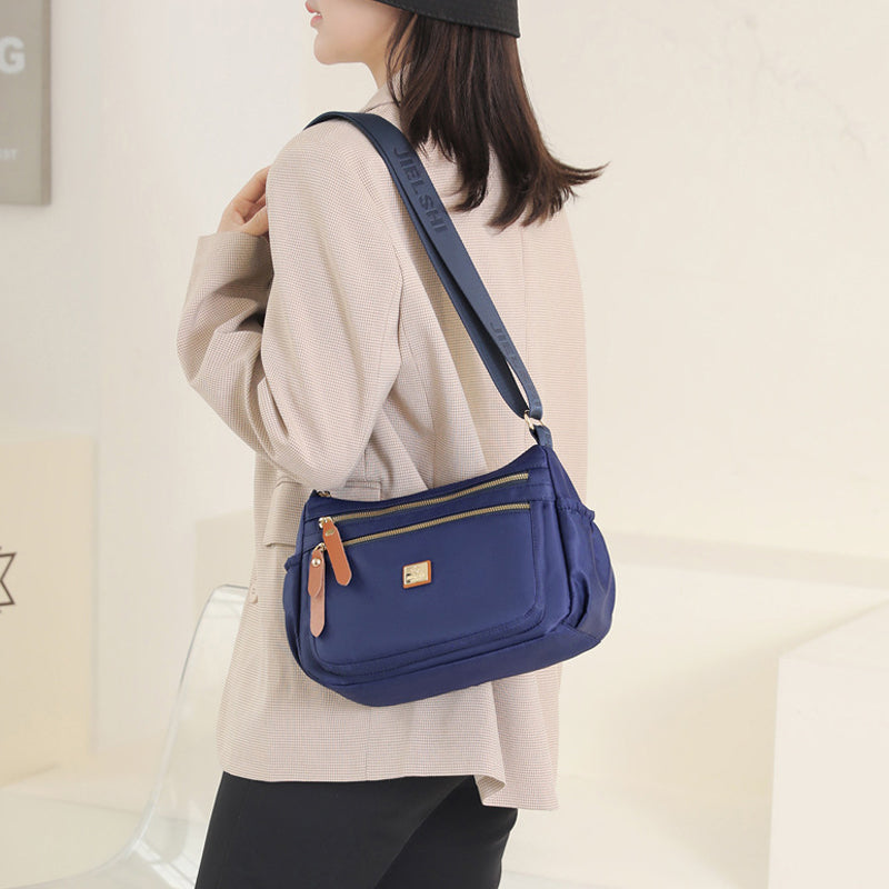 Multi-compartment shoulder bag – flewsail